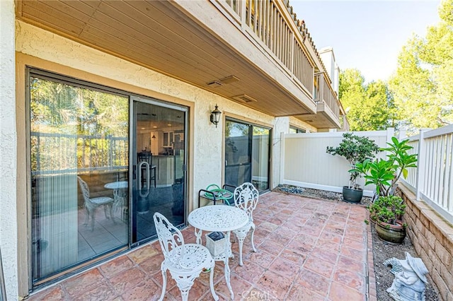 view of patio / terrace featuring a balcony