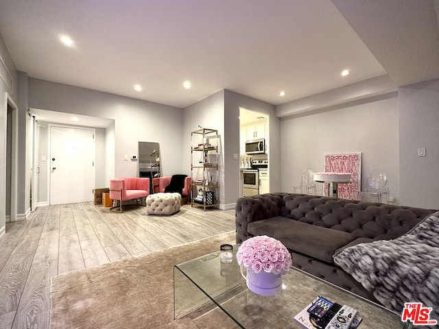 living room featuring light wood-type flooring