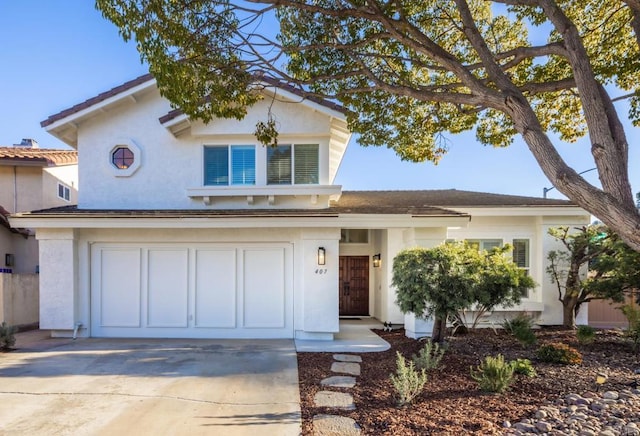 view of front of home with a garage