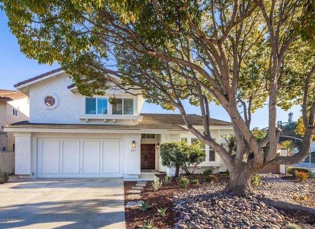 view of front of home with a garage