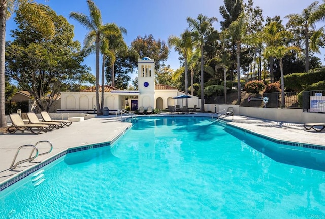 view of pool featuring a patio