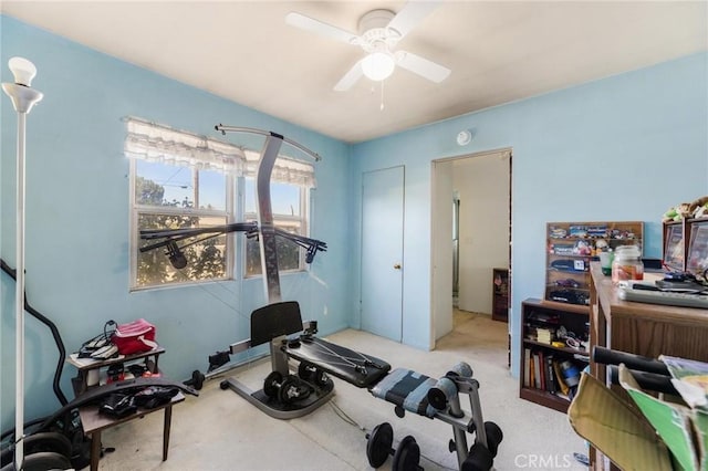 workout area featuring ceiling fan