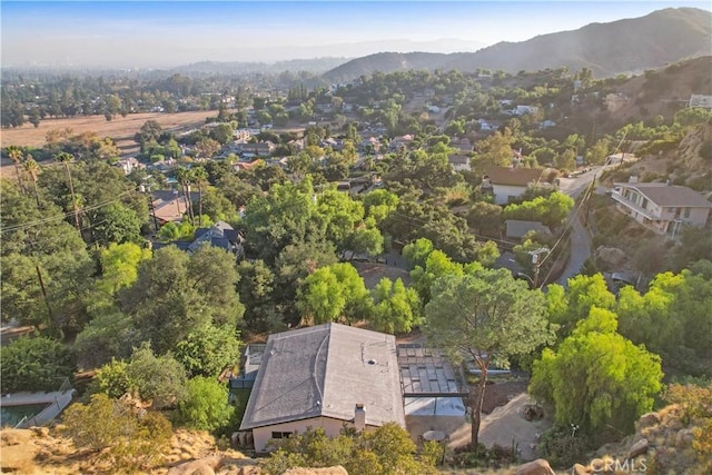 drone / aerial view featuring a mountain view