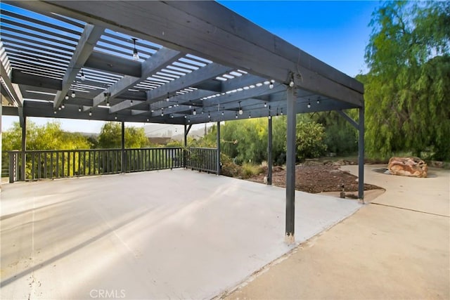 view of patio featuring a pergola