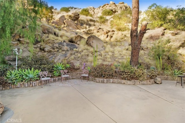 view of patio with a mountain view