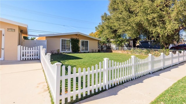 view of front of home with a front yard