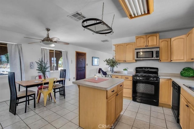 kitchen featuring ceiling fan, light brown cabinets, light tile patterned flooring, black appliances, and a center island