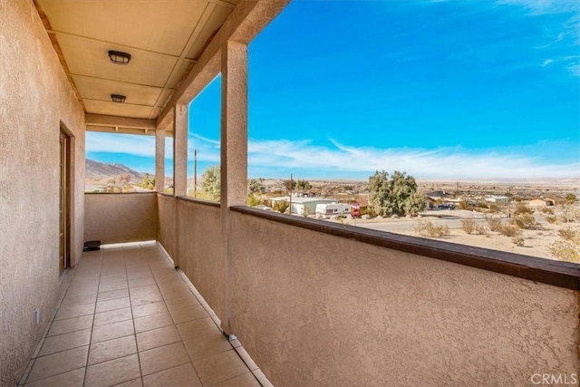 balcony featuring a mountain view