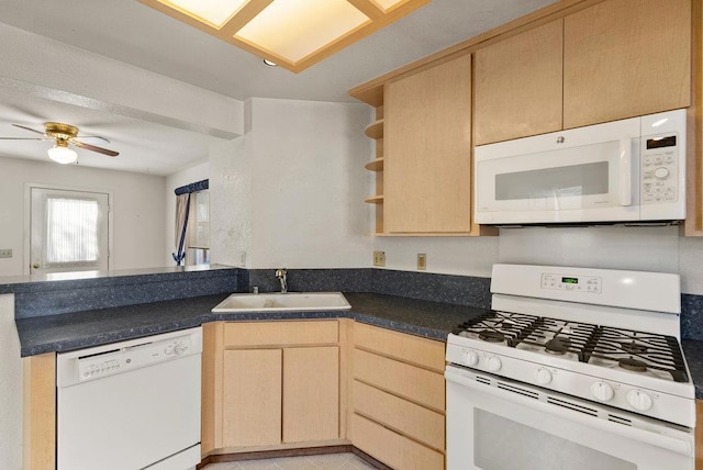 kitchen with light tile patterned floors, ceiling fan, light brown cabinets, white appliances, and sink