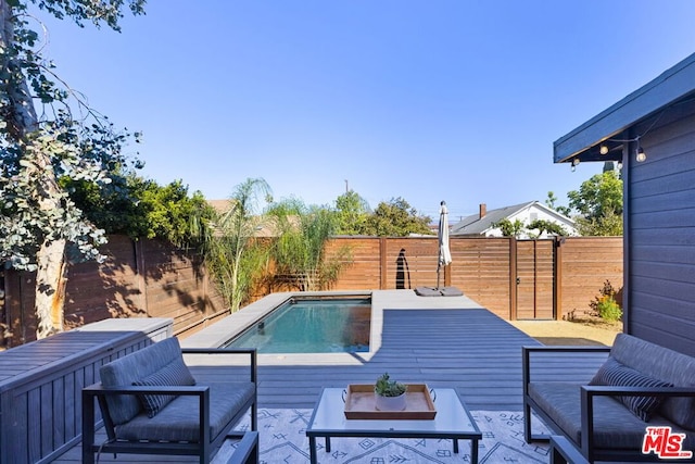 view of swimming pool featuring an outdoor hangout area