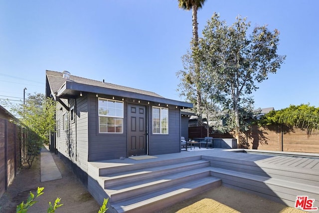 view of front of property featuring a deck