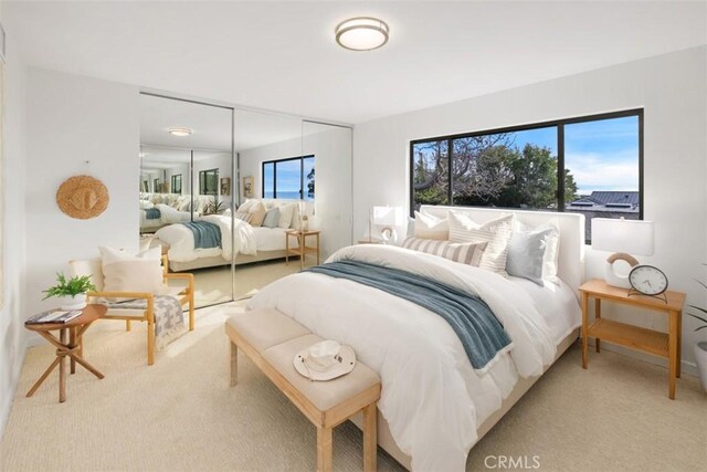 bedroom with light carpet