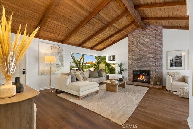 living room with wooden ceiling, a fireplace, dark hardwood / wood-style floors, and beamed ceiling