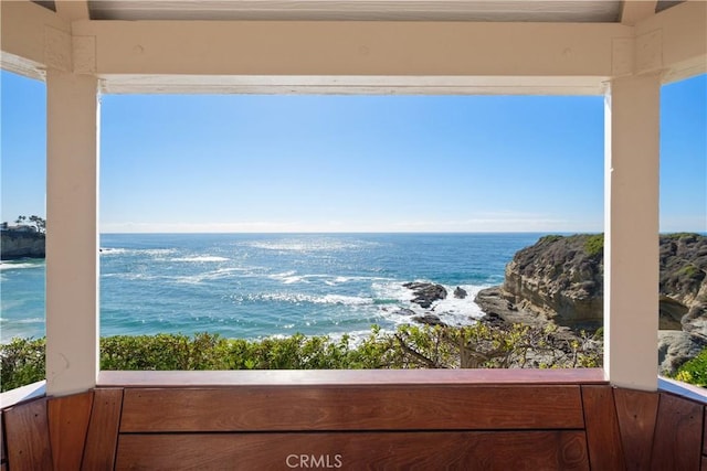 view of water feature with a beach view