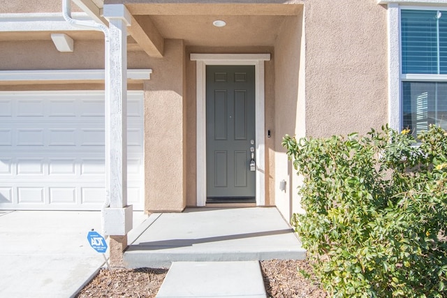 entrance to property with a garage