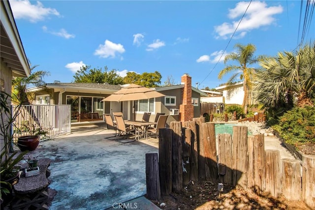 back of property with a patio area