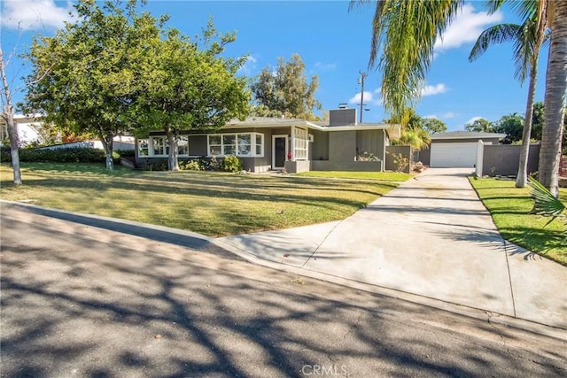 ranch-style house with a garage and a front yard