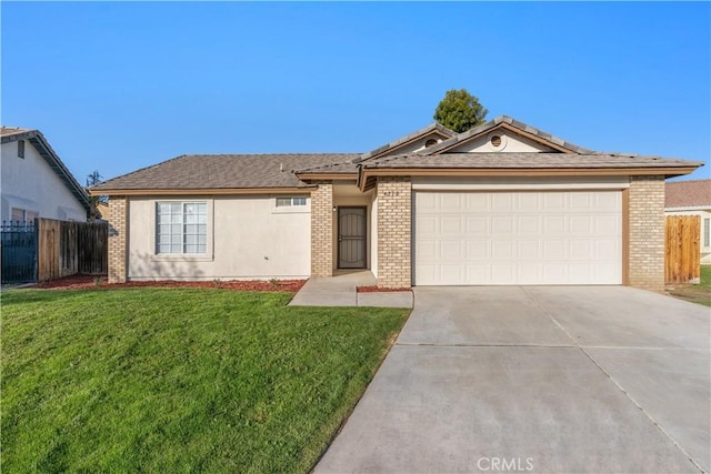 single story home with a front yard and a garage