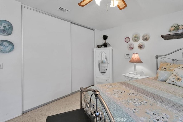 bedroom featuring ceiling fan and carpet floors