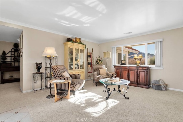 sitting room with light carpet and crown molding