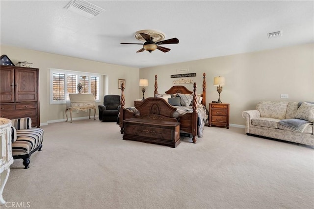 bedroom featuring ceiling fan and light colored carpet