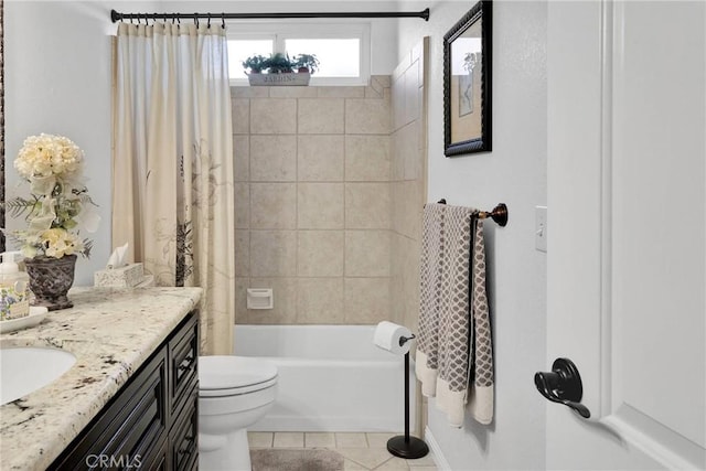 full bathroom featuring tile patterned flooring, toilet, vanity, and shower / bath combination with curtain