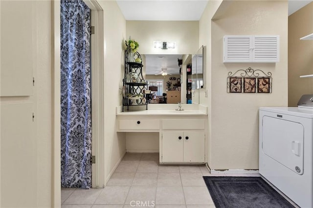 bathroom with ceiling fan, washer / dryer, vanity, and tile patterned flooring