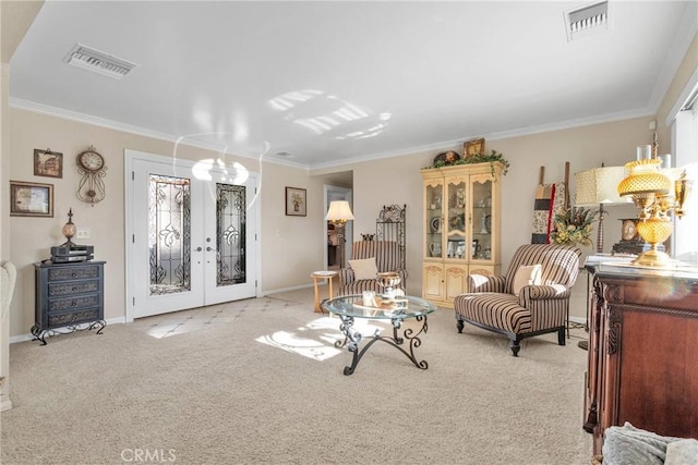 living area with light colored carpet, crown molding, and french doors