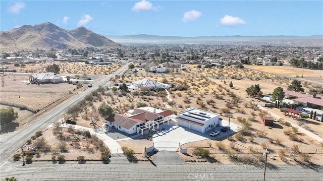 drone / aerial view featuring a mountain view