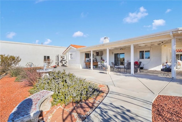 rear view of property with a patio area