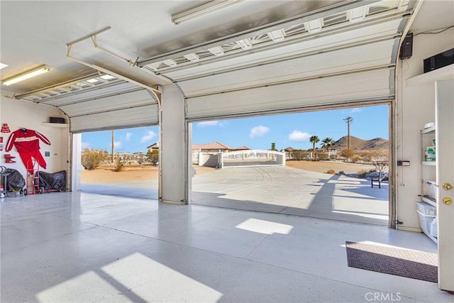 garage featuring a mountain view