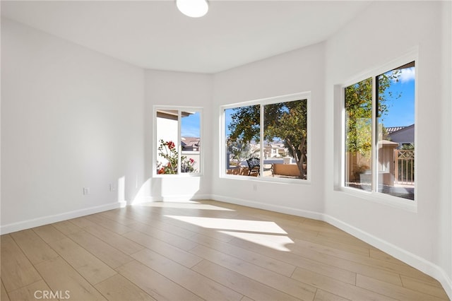 empty room featuring light hardwood / wood-style floors