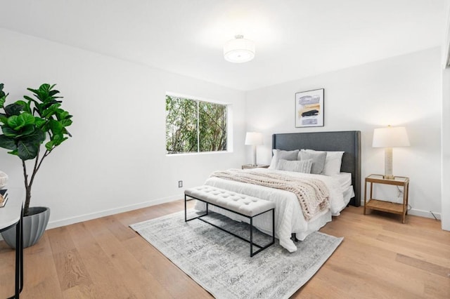 bedroom with light wood-type flooring