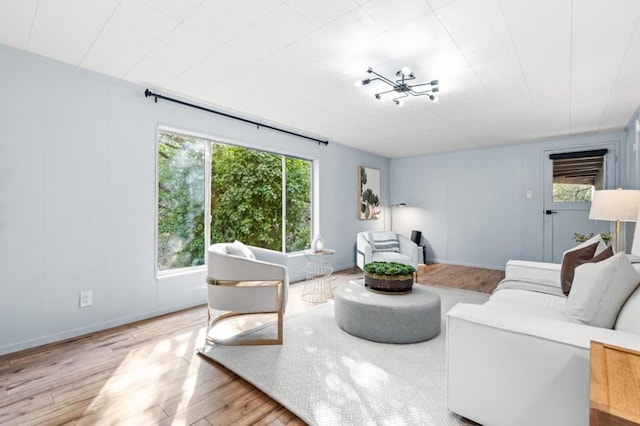 living room with light hardwood / wood-style flooring