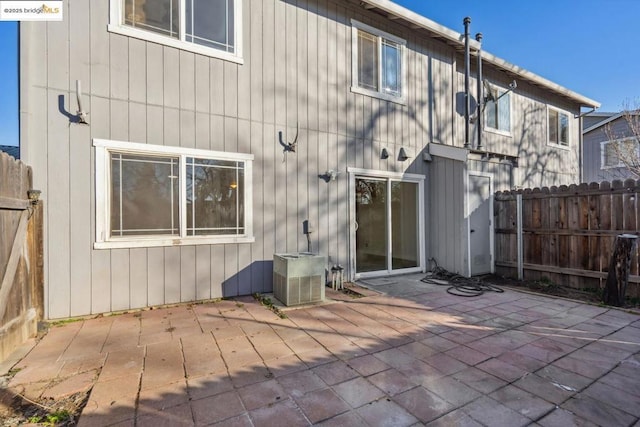 back of house with a patio