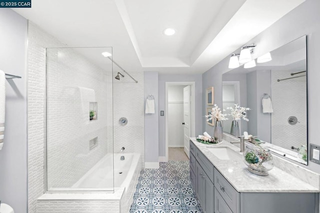 bathroom with vanity, tile patterned flooring, and plus walk in shower