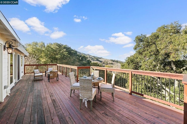 deck featuring a mountain view