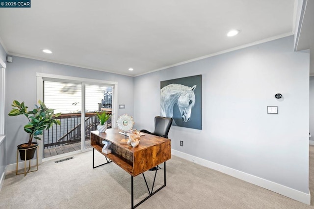 office space featuring crown molding and light colored carpet