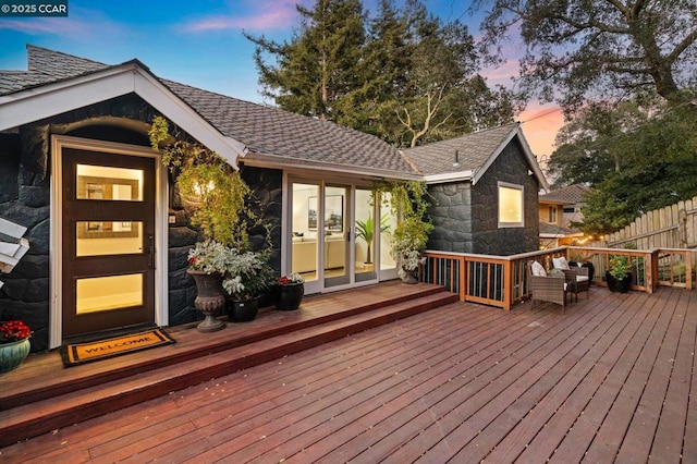 view of deck at dusk