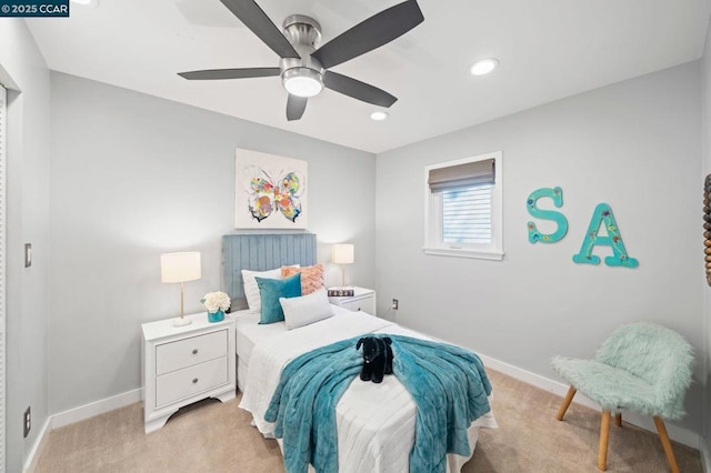 carpeted bedroom featuring ceiling fan