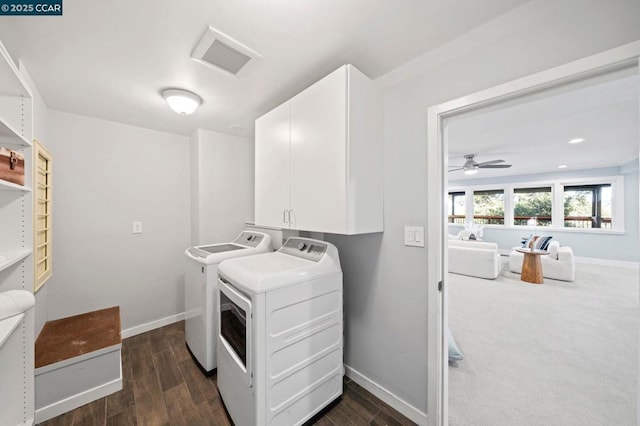 laundry area featuring cabinets, washer and dryer, and ceiling fan