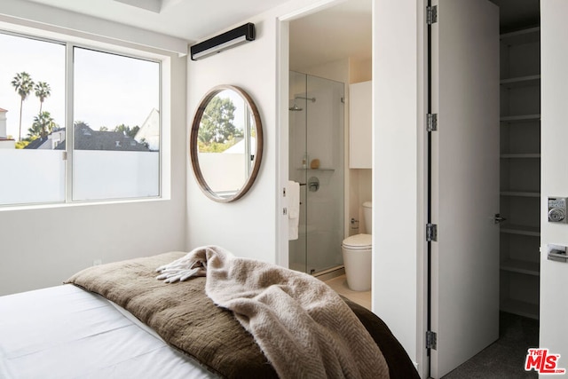 bedroom with ensuite bathroom