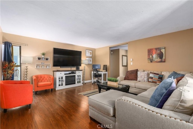 living room with dark hardwood / wood-style flooring