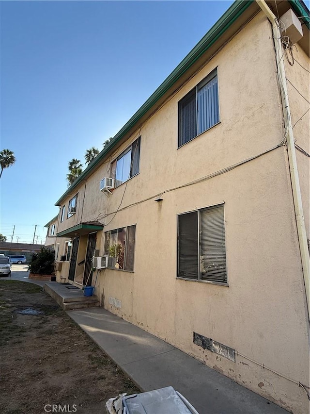 view of property with cooling unit