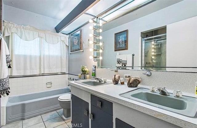 full bathroom with tile patterned floors, toilet, vanity, and independent shower and bath