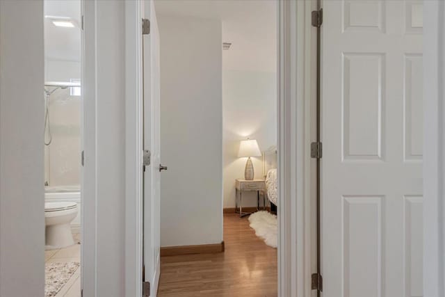 corridor featuring light wood-type flooring