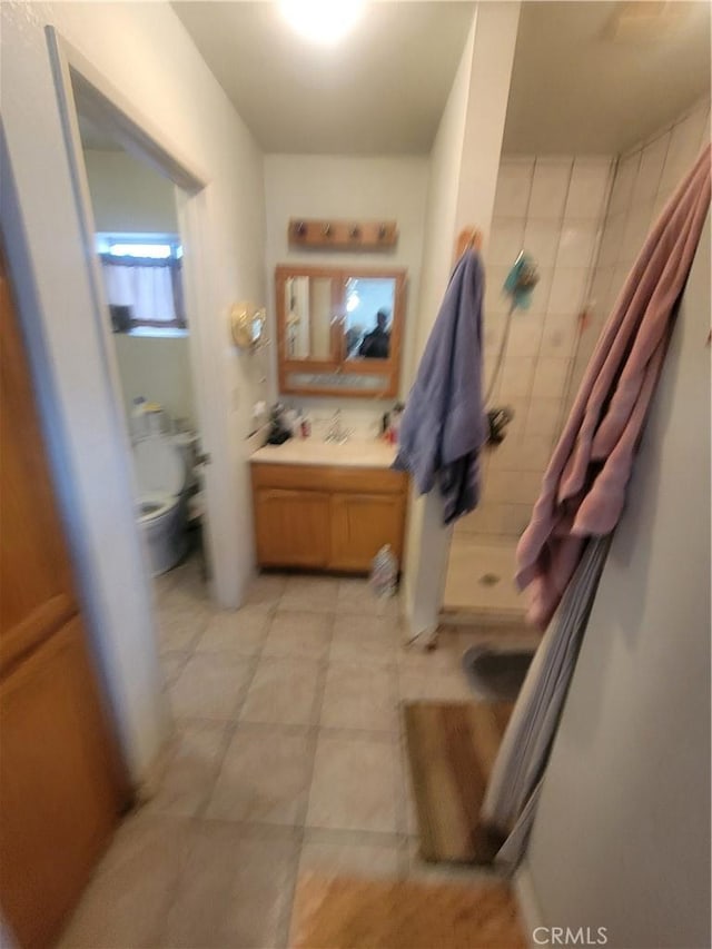 bathroom with toilet and walk in shower