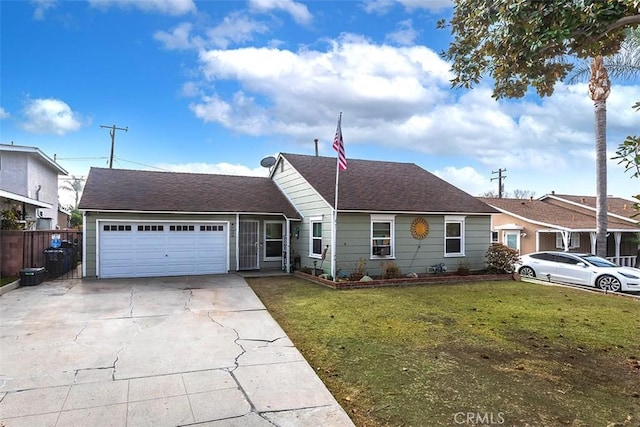 ranch-style home with a garage and a front lawn