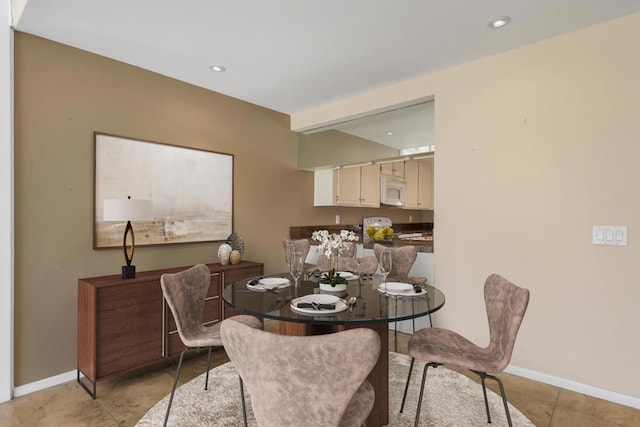 dining room with light tile patterned floors