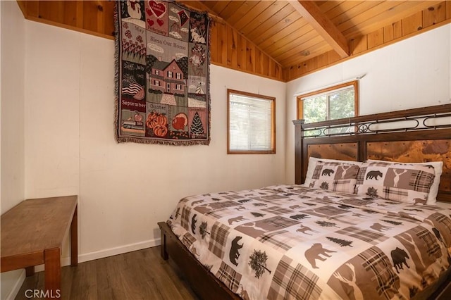 bedroom with lofted ceiling with beams, wood ceiling, and dark hardwood / wood-style flooring